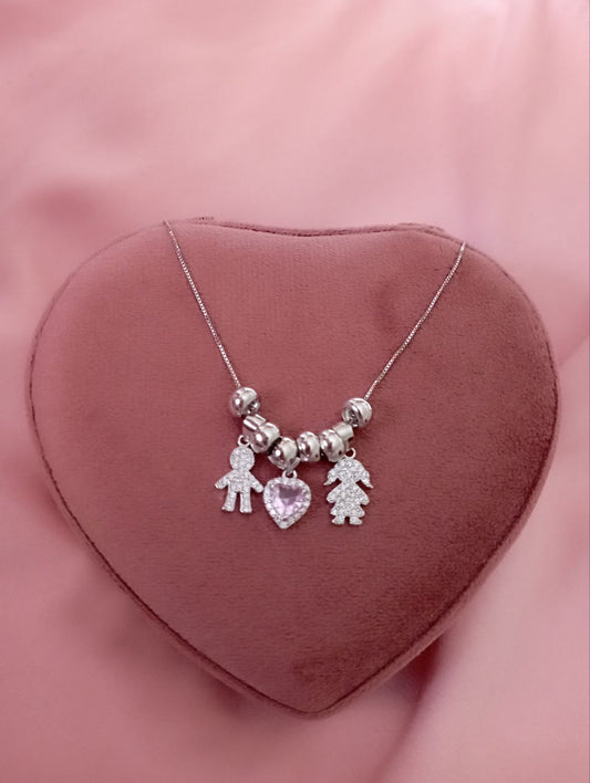 Collana con bimbo e bimba pendenti con cuore rosa e ciambelline - argento 925