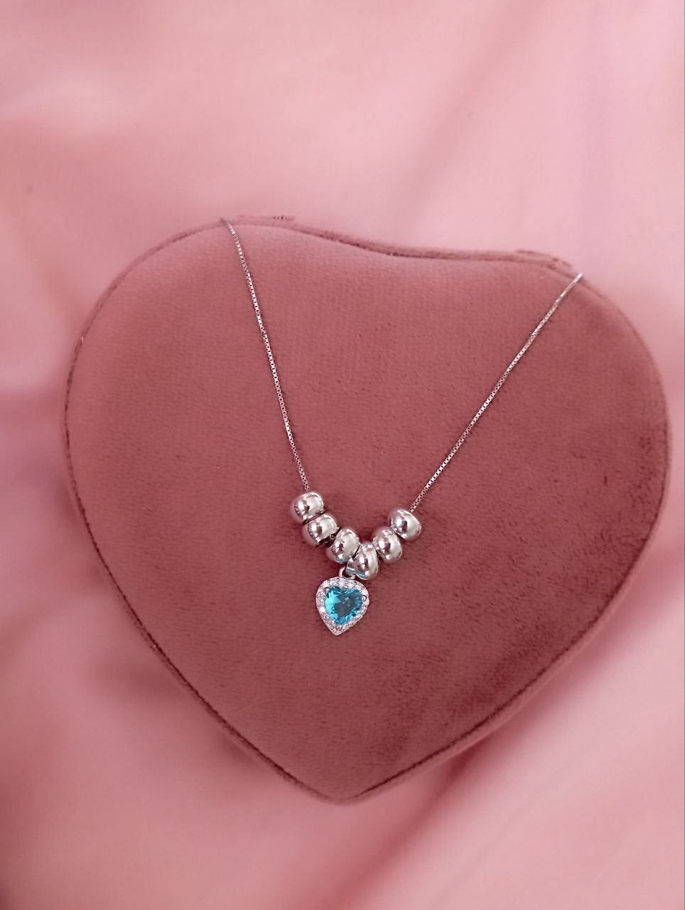 Collana con cuore azzurro e ciambelline     - argento 925