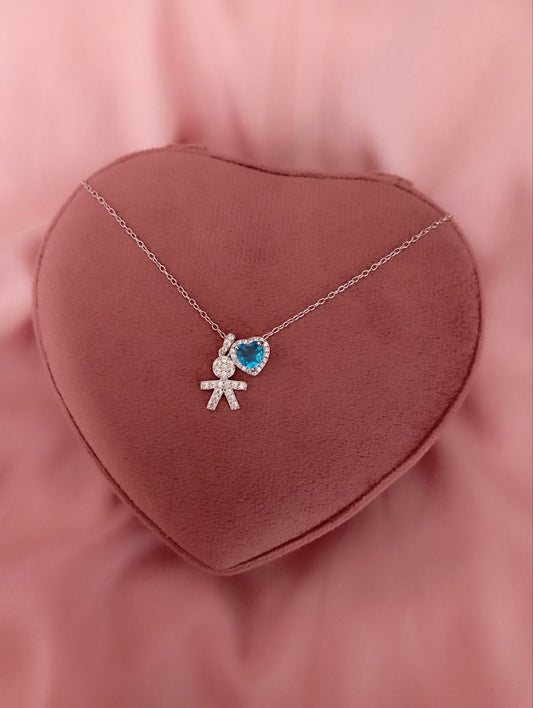 Collana rollo' con bimbo passante e cuore azzurro passante  - argento 925