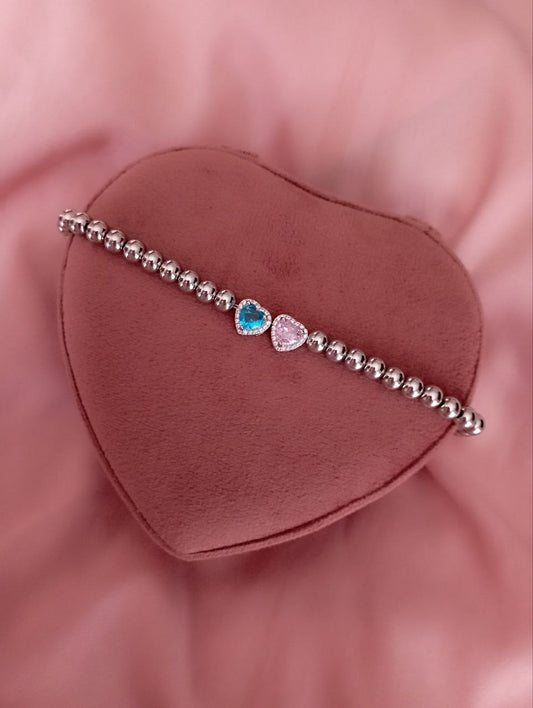 Bracciale perline cuore rosa e cuore azzurro passante    - argento 925