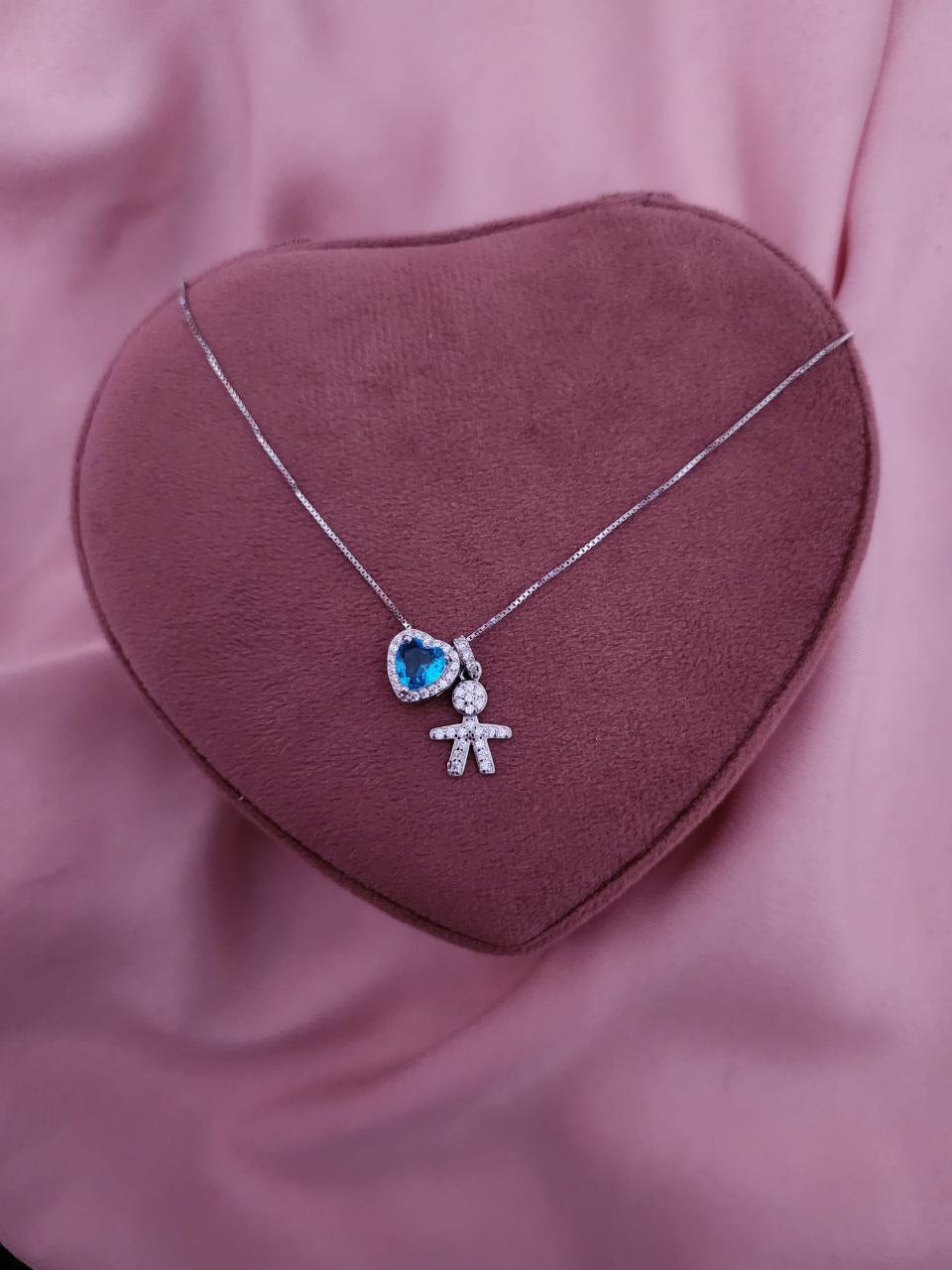 Collana con bimbo pendente e cuore azzurro passante  - argento 925